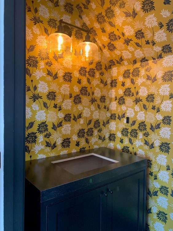 Black SparkleLam™ on the countertop of a powder room in a private residence.