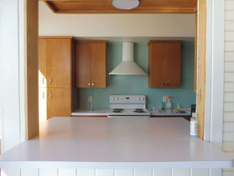 White SparkleLam™ countertops in a fresh, vintage remodel of a private residence.