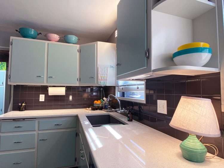 Gloss solid ceramic wall tile in Graphite on the backsplash of  a vintage kitchen remodel in a private residence.