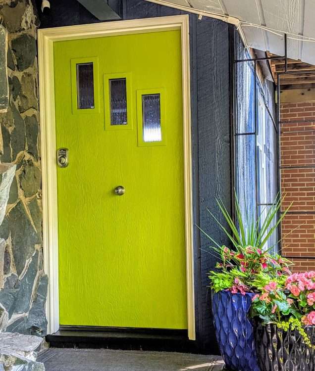 The Elaine door kit outside on a private residence in an amazing shade of green.