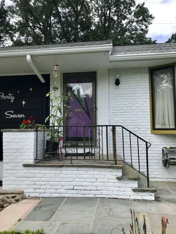 Becky exterior door kit with custom rain-patterned glass.