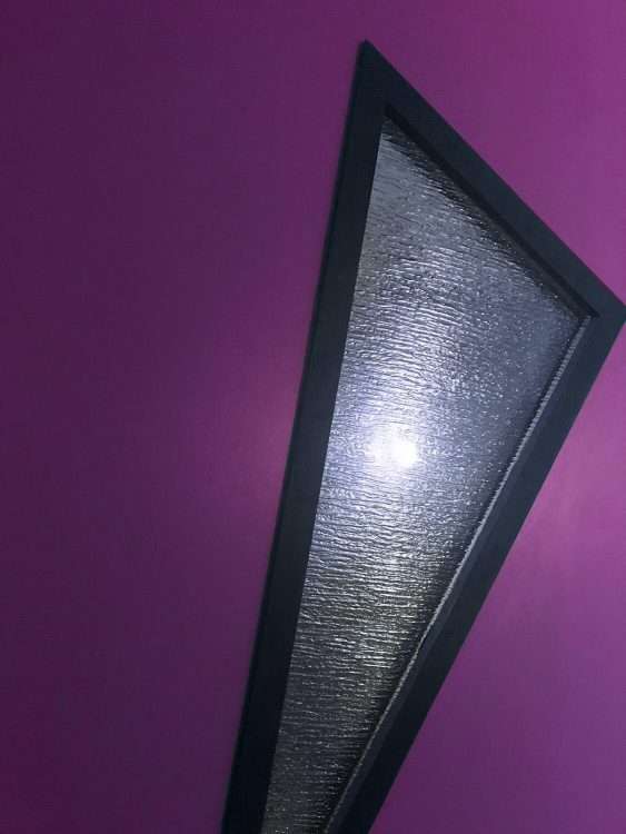 Becky exterior door kit with custom rain-patterned glass.
