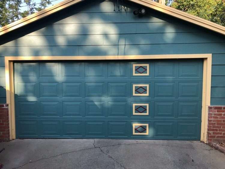 Our Stephen garage door kit dresses up standard raised panel garage door of this residential home. Color makes all the difference!