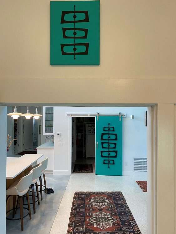 The Debbie Irene interior door kit in a private residence. Our kit is part of our Donna Mibus line - her artwork, which inspired the door kit, hangs in the residence.