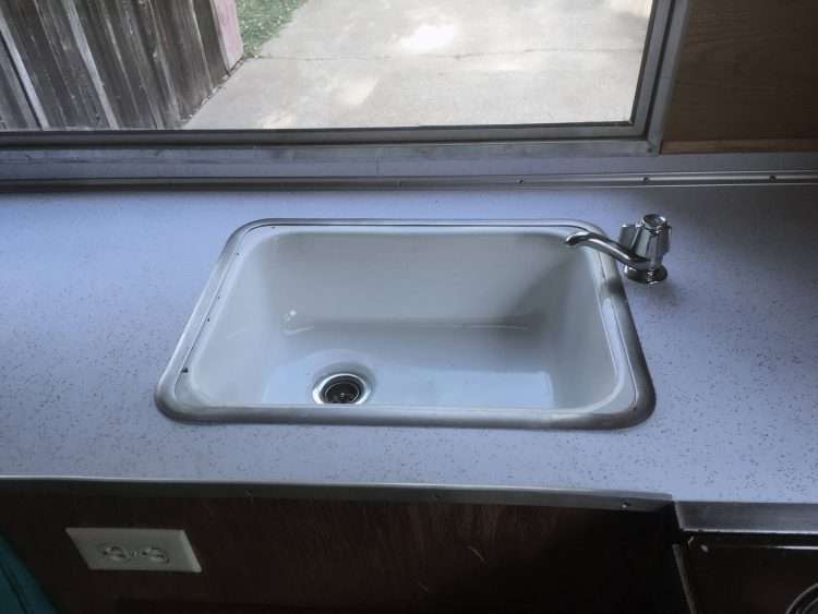 Vintage trailer restoration. Countertops in white SparkleLam™.