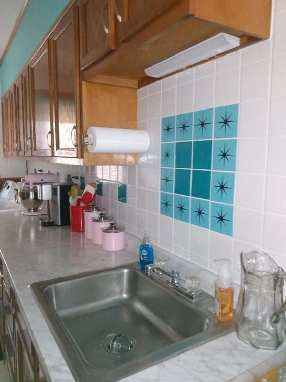 Custom decorative ceramic tiles in solid and starburst for a private residence.