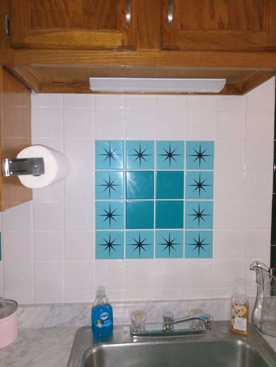 Custom decorative ceramic tiles in solid and starburst for a private residence.
