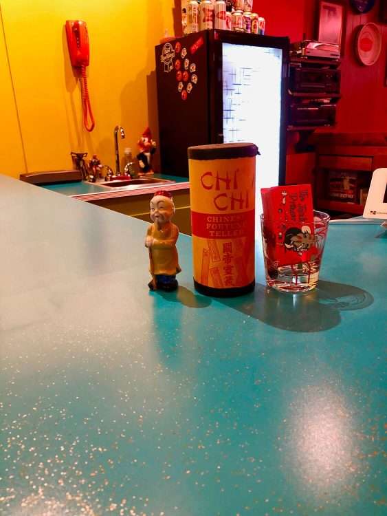 From a bar and vintage store in Seattle. Countertops in Dark Aqua SparkleLam™.