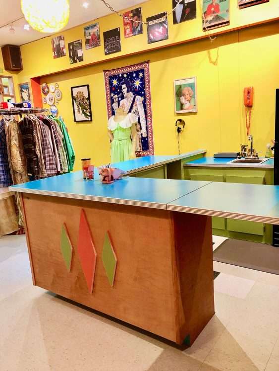 From a bar and vintage store in Seattle. Countertops in Dark Aqua SparkleLam™.