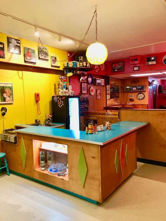 From a bar and vintage store in Seattle. Countertops in Dark Aqua SparkleLam™.