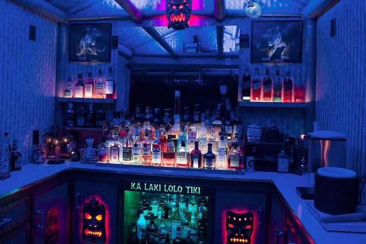 Tiki bar in a private home made by the homeowner. This show dramatic night lighting.