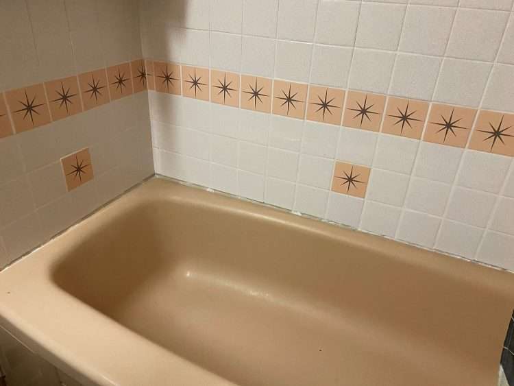 Bathroom in private residence. Custom Starburst Tile to match bathroom fixtures.