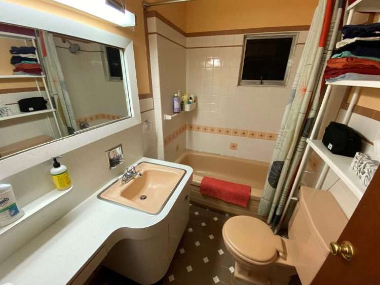 Bathroom in private residence. Custom Starburst Tile to match bathroom fixtures.